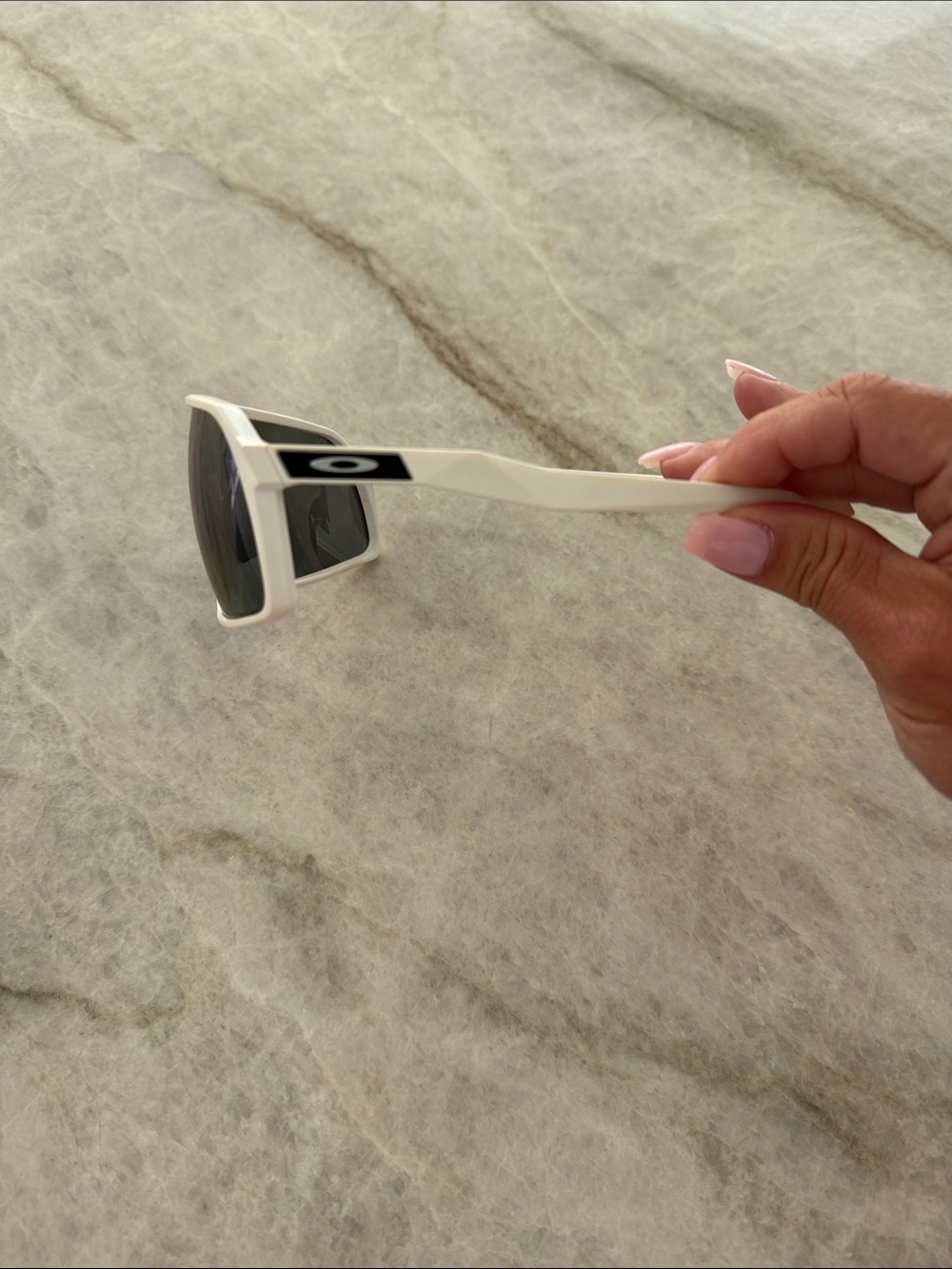 Oakley White Frame Sunglasses with Dark Lenses